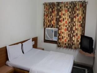 Hotel Sun Shine Gandhinagar Bagian luar foto